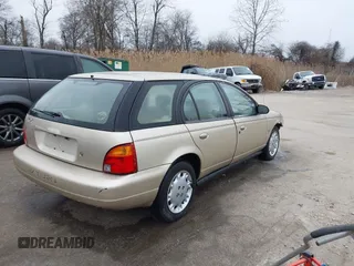 1997 Saturn SW z VIN 1G8ZK8270VZ205793, wystawiony jako IAAI lot #41609103 z przebiegiem 120 754 mil mil oraz . Historia ofert i sprzedaży dostępna na DreamBid. Obrazek 4.