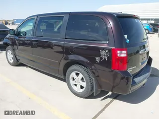 2010 Dodge Grand Caravan SE with VIN 2D4RN4DE4AR307803, listed as a IAAI auction lot 41838330 with 87,863 mi miles. Bid and sale history available at carsss.com. Image 3.
