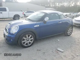 2012 MINI Coupe S z VIN WMWSX3C59CT465664, wystawiony jako Copart lot #53551055 z przebiegiem 94 390 mil mil oraz Szkody całkowita. Historia ofert i sprzedaży dostępna na DreamBid. Obrazek 1.