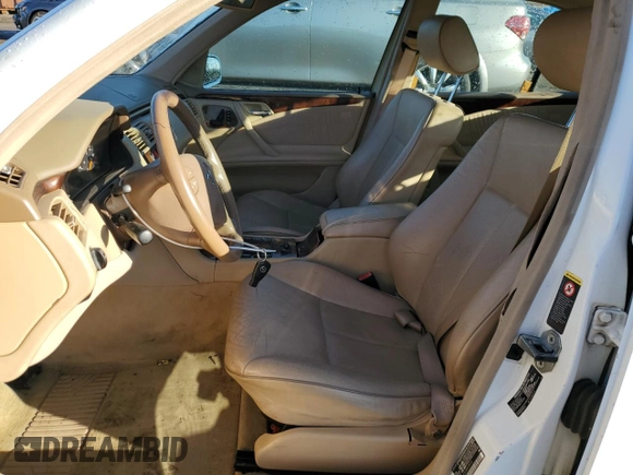 2002 Mercedes-Benz E-Class with VIN WDBJF65J62B423016, listed as a Copart auction lot 79806394 with 154,537 mi miles and Salvage Title. Bid and sale history available at carsss.com. Image 7.