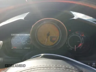 2010 Ferrari California z VIN ZFF65LJA9A0174625, wystawiony jako Copart lot #77766884 z przebiegiem 28 829 mil mil oraz Szkody całkowita. Historia ofert i sprzedaży dostępna na DreamBid. Obrazek 9.