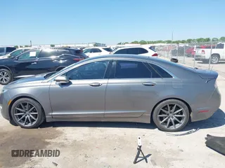 2014 Lincoln MKZ z VIN 3LN6L2G92ER835456, wystawiony jako IAAI lot #41985573 z przebiegiem 174 080 mil mil oraz . Historia ofert i sprzedaży dostępna na DreamBid. Obrazek 14.
