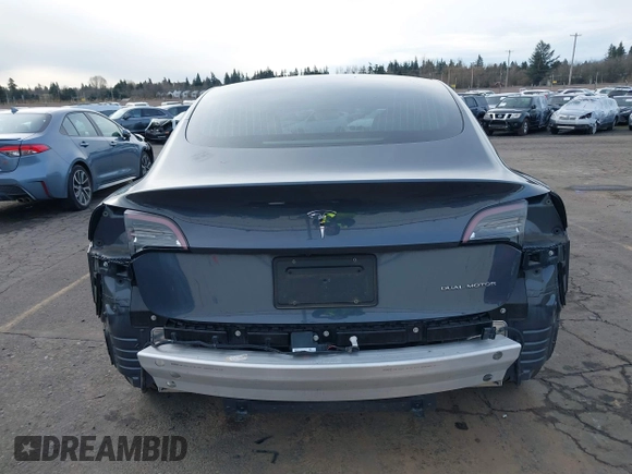 2018 Tesla Model 3 Long Range Battery with VIN 5YJ3E1EB9JF097118, listed as a IAAI auction lot 41619510 with 64,132 mi miles and . Bid and sale history available at DreamBid. Image 17.