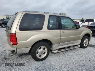 2002 Ford Explorer Sport Value with VIN 1FMYU60EX2UC31677, listed as a Copart auction lot 46415785 with 104,684 mi miles and Salvage title. Bid and sale history available at DreamBid. Image 3.
