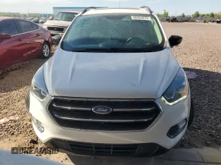 2017 Ford Escape SE z VIN 1FMCU9G97HUC26806, wystawiony jako Copart lot #65464674 z przebiegiem 93 023 mil mil oraz Szkoda całkowita • Salvage title. Historia ofert i sprzedaży dostępna na DreamBid. Obrazek 5.