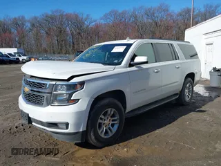 2016 Chevrolet Suburban LT with VIN 1GNSKHKCXGR206948, listed as a IAAI auction lot 41842774 with 190,935 mi miles. Bid and sale history available at carsss.com. Image 2.