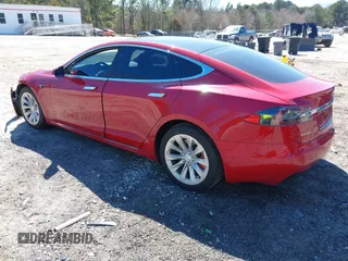 2018 Tesla Model S 75D with VIN 5YJSA1E2XJF295777, listed as a IAAI auction lot 41694540 with 70,428 mi miles and . Bid and sale history available at DreamBid. Image 3.