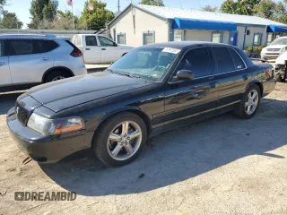 2003 Mercury Marauder with VIN 2MEHM75VX3X655842, listed as a Copart auction lot 74397554 with 185,413 mi miles and Salvage Title. Bid and sale history available at carsss.com. Image 1.