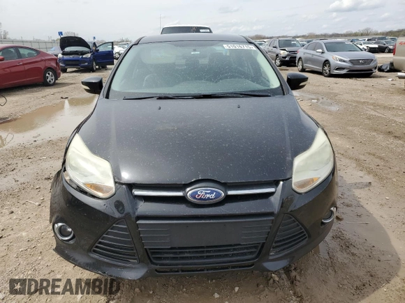 2013 Ford Focus SE z VIN 1FADP3F28DL292238, wystawiony jako Copart lot #51016715 z przebiegiem 165 699 mil mil oraz Szkoda całkowita • Salvage title. Historia ofert i sprzedaży dostępna na DreamBid. Obrazek 5.