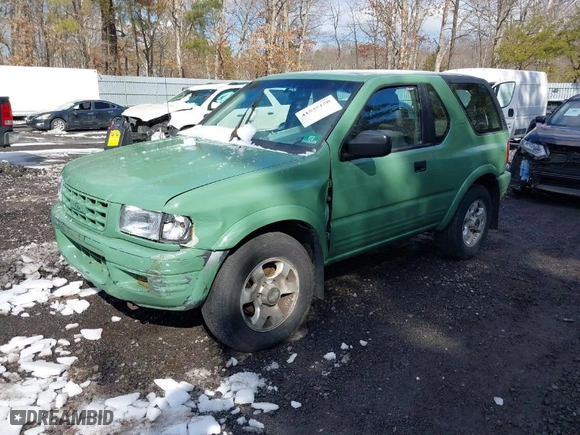 1999 Isuzu Rodeo Sport with VIN 4S2CM57WXX4365253, listed as a IAAI auction lot 41535150 with 221,024 mi miles. Bid and sale history available at carsss.com. Image 2.