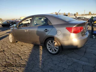 2012 Kia Forte SX with VIN KNAFW4A38C5527362, listed as a Copart auction lot 88946585 with 129,317 mi miles and Salvage Title. Bid and sale history available at carsss.com. Image 2.