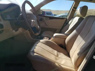 2002 Mercedes-Benz E-Class with VIN WDBJH82J42X066433, listed as a Copart auction lot 75933054 with 134,476 mi miles and Clean Title. Bid and sale history available at carsss.com. Image 7.