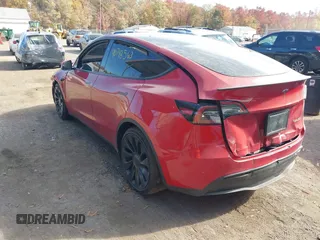 2023 Tesla Model Y Performance with VIN 7SAYGDEF6PF870935, listed as a IAAI auction lot 40718563 with 15,286 mi miles and . Bid and sale history available at DreamBid. Image 3.