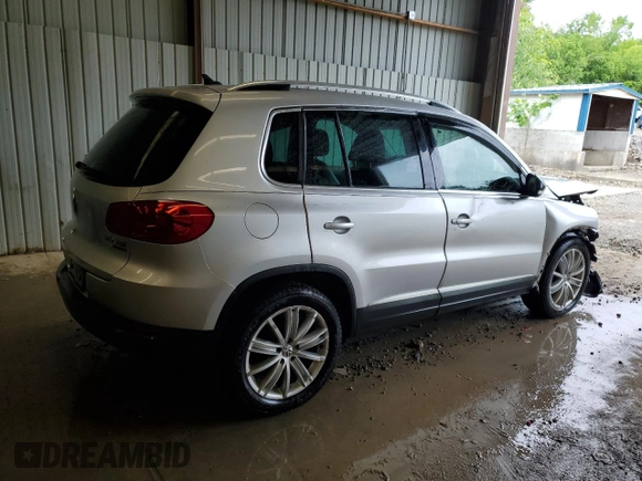 2013 Volkswagen Tiguan SE with VIN WVGBV7AX1DW504036, listed as a Copart auction lot 61126145 with 148,399 mi miles and Salvage title. Bid and sale history available at DreamBid. Image 3.