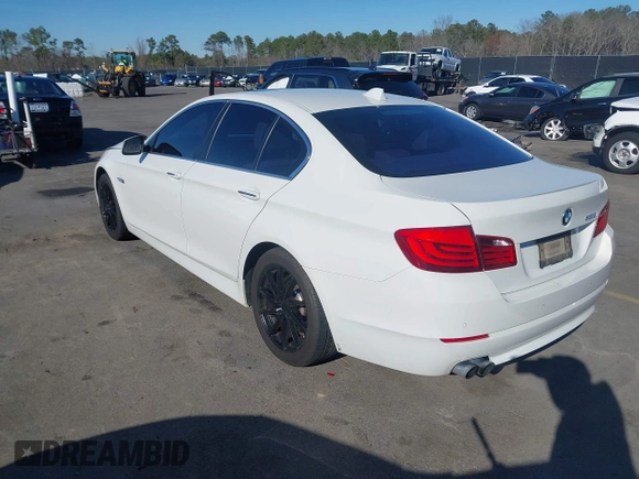 2013 BMW 5 Series 528i with VIN WBAXG5C53DD232909, listed as a IAAI auction lot 41620696 with 181,375 mi miles and . Bid and sale history available at carsss.com. Image 3.