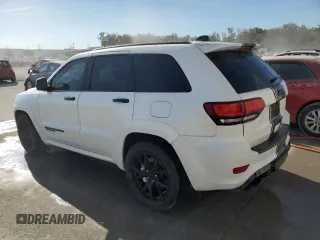 2019 Jeep Grand Cherokee Trackhawk with VIN 1C4RJFN92KC564748, listed as a Copart auction lot 82677504 with 48,528 mi miles and Salvage title. Bid and sale history available at DreamBid. Image 2.