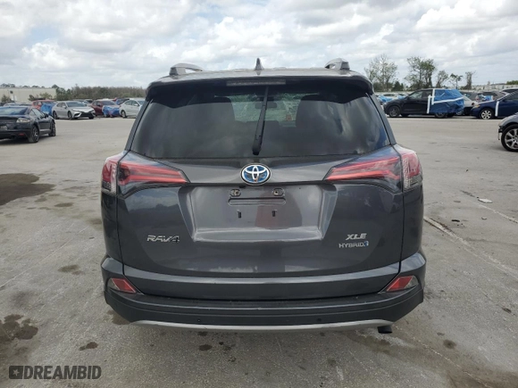 2018 Toyota RAV4 Hybrid LE Plus with VIN JTMRJREV9JD239456, listed as a Copart auction lot 47794485 with 128,136 mi miles and Salvage Title. Bid and sale history available at carsss.com. Image 6.
