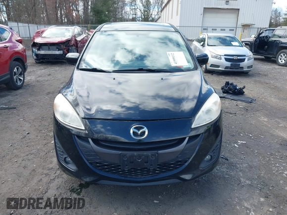 2012 Mazda 5 Touring with VIN JM1CW2CL8C0111574, listed as a IAAI auction lot 41999112 with 126,963 mi miles and . Bid and sale history available at DreamBid. Image 12.