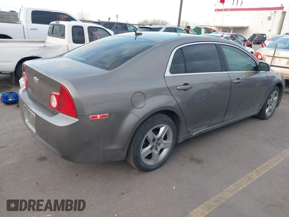 2010 Chevrolet Malibu 1LT with VIN 1G1ZC5EB4AF153574, listed as a IAAI auction lot 41670974 with 163,184 mi miles and . Bid and sale history available at DreamBid. Image 4.