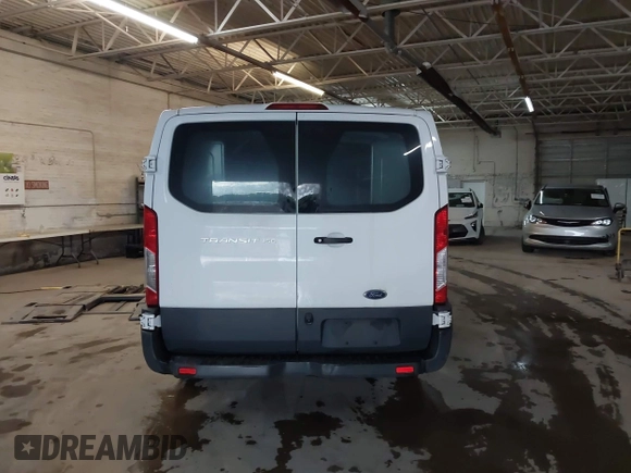 2018 Ford Transit with VIN 1FTYE1ZM2JKB30853, listed as a IAAI auction lot 42025674 with 188,545 mi miles and . Bid and sale history available at DreamBid. Image 16.