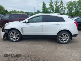 2012 Cadillac SRX Performance Collection with VIN 3GYFNEE34CS579352, listed as a IAAI auction lot 42627607 with 168,752 mi miles and . Bid and sale history available at DreamBid. Image 14.