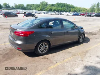 2016 Ford Focus SE with VIN 1FADP3F28GL270325, listed as a IAAI auction lot 42656953 with 120,833 mi miles and . Bid and sale history available at DreamBid. Image 4.