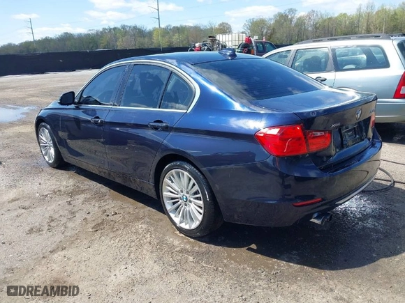 2013 BMW 3 Series 328i xDrive with VIN WBA3B3C54DF532965, listed as a IAAI auction lot 41955104 with 150,455 mi miles. Bid and sale history available at carsss.com. Image 3.