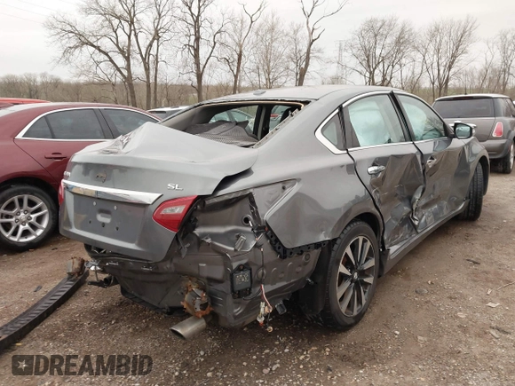 2018 Nissan Altima SR with VIN 1N4AL3AP1JC244271, listed as a IAAI auction lot 41828261 with 134,258 mi miles and . Bid and sale history available at carsss.com. Image 4.