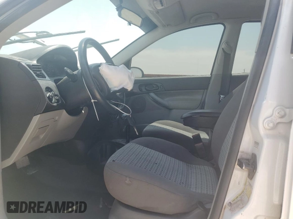 2007 Ford Focus S z VIN 1FAFP34N27W186716, wystawiony jako Copart lot #54894055 z przebiegiem 86 305 mil mil oraz Szkoda całkowita • Salvage title. Historia ofert i sprzedaży dostępna na DreamBid. Obrazek 7.