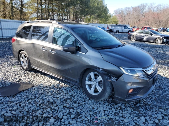 2018 Honda Odyssey EX-L with VIN 5FNRL6H75JB044985, listed as a Copart auction lot 50081345 with 157,688 mi miles and Salvage Title. Bid and sale history available at DreamBid. Image 4.