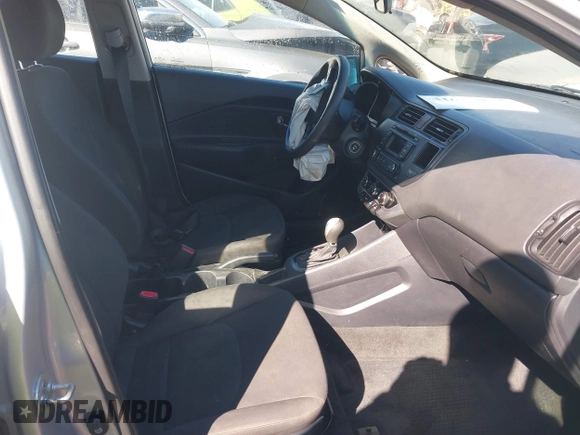 2014 Kia Rio LX with VIN KNADM4A35E6395218, listed as a IAAI auction lot 41614054 with 134,535 mi miles and . Bid and sale history available at DreamBid. Image 5.
