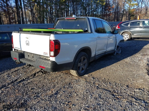 2021 Honda Ridgeline Sport with VIN 5FPYK3F1XMB011441, listed as a IAAI auction lot 41315524 with 59,840 mi miles. Bid and sale history available at carsss.com. Image 4.