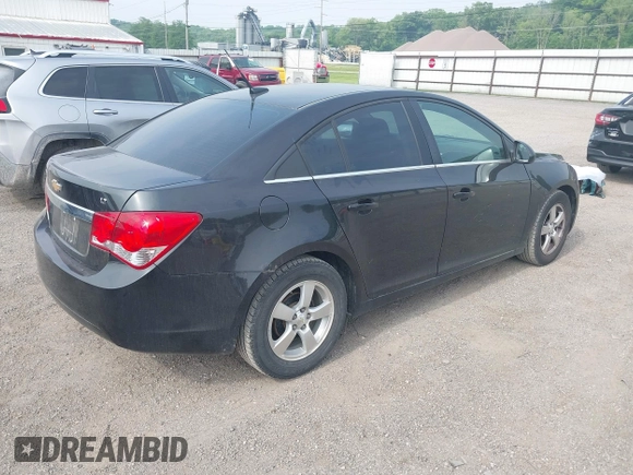 2014 Chevrolet Cruze 1LT with VIN 1G1PC5SB0E7291575, listed as a IAAI auction lot 42417379 with 111,705 mi miles and . Bid and sale history available at DreamBid. Image 4.