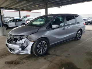 2022 Honda Odyssey EX-L z VIN 5FNRL6H79NB040847, wystawiony jako Copart lot #48976685 z przebiegiem 62 045 mil mil oraz Szkody całkowita. Historia ofert i sprzedaży dostępna na DreamBid. Obrazek 1.