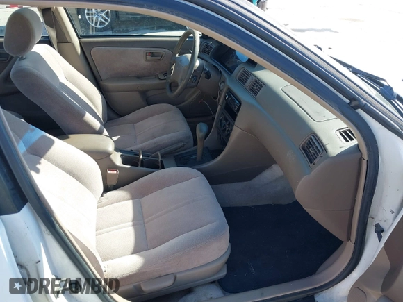 1998 Toyota Camry LE z VIN JT2BF22K9W0090879, wystawiony jako IAAI lot #41860538 z przebiegiem 248 879 mil mil oraz . Historia ofert i sprzedaży dostępna na DreamBid. Obrazek 5.