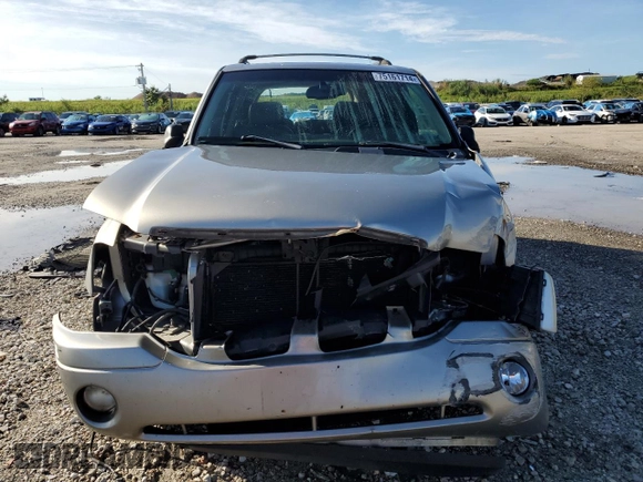 2002 GMC Envoy SLT with VIN 1GKDT13S122491329, listed as a Copart auction lot 75161714 with 149,659 mi miles and Salvage Title. Bid and sale history available at DreamBid. Image 5.