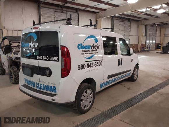 2017 Ram ProMaster City Cargo Van Tradesman SLT with VIN ZFBERFBB7H6E07275, listed as a IAAI auction lot 41607879 with 108,618 mi miles. Bid and sale history available at carsss.com. Image 4.