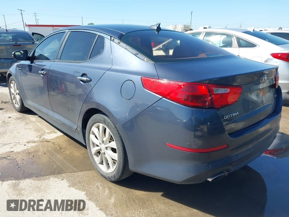 2015 Kia Optima LX with VIN 5XXGM4A71FG400128, listed as a IAAI auction lot 42106109 with 185,667 mi miles and . Bid and sale history available at carsss.com. Image 3.