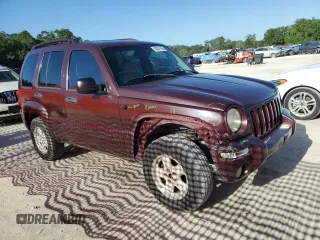 2003 Jeep Liberty Limited with VIN 1J4GK58K03W505110, listed as a Copart auction lot 55057165 with 165,021 mi miles and Salvage Title. Bid and sale history available at carsss.com. Image 4.