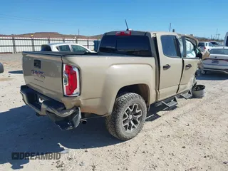 2022 GMC Canyon 4WD AT4 with VIN 1GTG6FENXN1209168, listed as a IAAI auction lot 41395982 with 39,779 mi miles and . Bid and sale history available at carsss.com. Image 4.