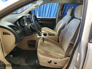 2014 Dodge Grand Caravan SXT 30th Anniversary with VIN 2C4RDGCG4ER213401, listed as a Copart auction lot 52157035 with 178,863 mi miles and Clean Title. Bid and sale history available at carsss.com. Image 7.