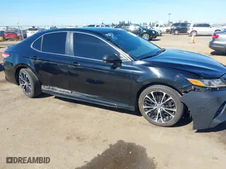 2018 Toyota Camry LE with VIN JTNB11HKXJ3071137, listed as a IAAI auction lot 41699856 with 102,310 mi miles. Bid and sale history available at carsss.com. Image 6.