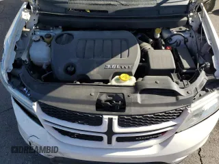 2013 Dodge Journey R/T with VIN 3C4PDCEG3DT659001, listed as a Copart auction lot 78187554 with 128,052 mi miles and Salvage title. Bid and sale history available at DreamBid. Image 12.
