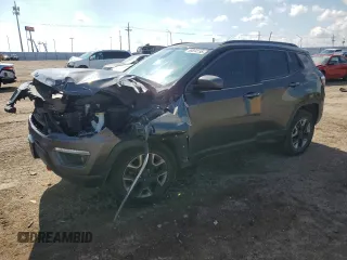 2018 Jeep Compass Trailhawk with VIN 3C4NJDDB0JT458339, listed as a Copart auction lot 58834155 with 103,811 mi miles and Salvage title. Bid and sale history available at DreamBid. Image 1.