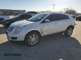 2015 Cadillac SRX Luxury Collection with VIN 3GYFNBE32FS567736, listed as a Copart auction lot 47040975 with 132,936 mi miles and Salvage Title. Bid and sale history available at carsss.com. Image 1.