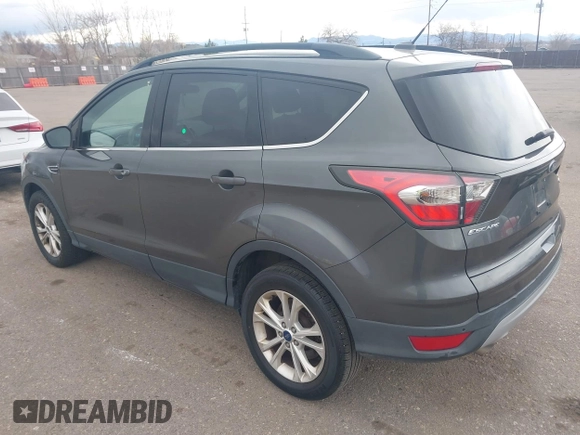 2017 Ford Escape SE with VIN 1FMCU9GD1HUB46034, listed as a IAAI auction lot 41840906 with 143,806 mi miles. Bid and sale history available at carsss.com. Image 3.