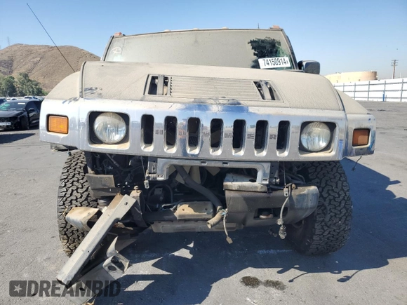 2004 Hummer H2 with VIN 5GRGN23U24H104327, listed as a Copart auction lot 74150914 with 181,933 mi miles and Salvage Title. Bid and sale history available at carsss.com. Image 5.