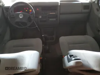 2002 Volkswagen EuroVan с VIN WV2KB47072H012135, выставлен на аукционе Copart как лот 84215364 с пробегом 170 220 миль миль и Чистый • Clean title. История ставок и продаж доступна на DreamBid. Изображение 8.