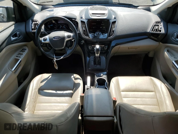 2014 Ford Escape Titanium с VIN 1FMCU0J96EUD41199, выставлен на аукционе Copart как лот 59380245 с пробегом 100 319 миль миль и Списание • Salvage title. История ставок и продаж доступна на DreamBid. Изображение 8.