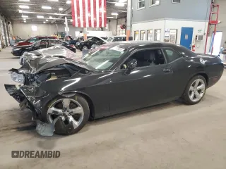2013 Dodge Challenger R/T z VIN 2C3CDYBT9DH501059, wystawiony jako Copart lot #55139865 z przebiegiem 95 112 mil mil oraz Szkoda całkowita • Salvage title. Historia ofert i sprzedaży dostępna na DreamBid. Obrazek 1.